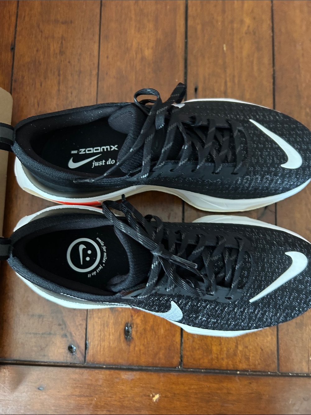 Nike Men’s Black and White Athletic Running Shoes with Red Accent